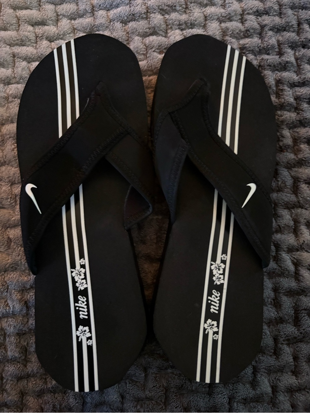 Nike Black Flip-Flop Sandals with White Stripe Accents